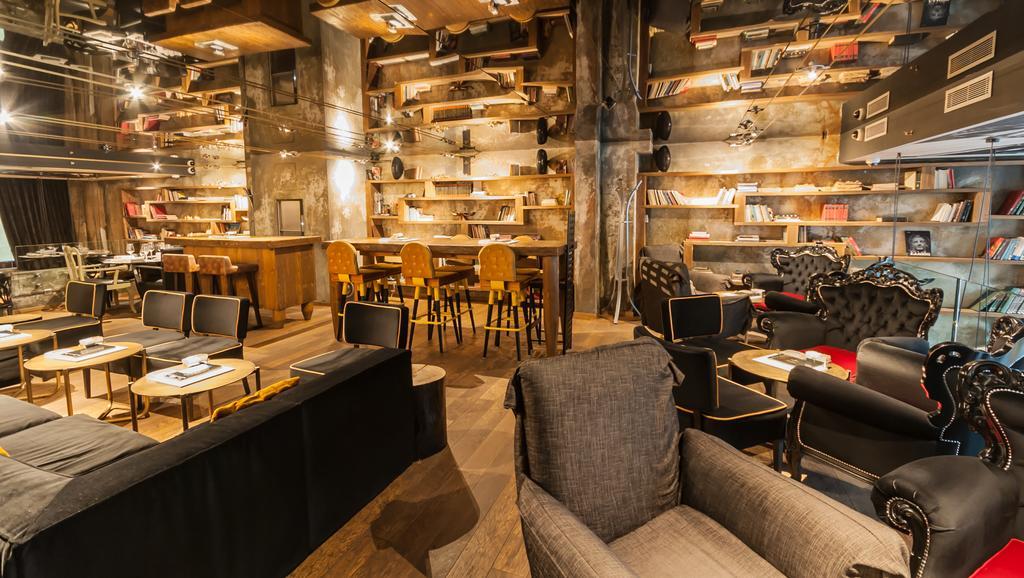 Hotel Hemera Podgorica Extérieur photo Interior of a Starbucks Reserve store in Milan, Italy