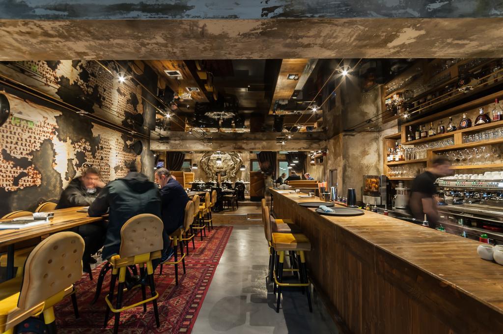 Hotel Hemera Podgorica Extérieur photo Interior of a Starbucks Reserve store in Milan, Italy